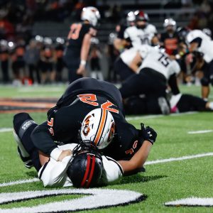 Tigers Flatten Bulldogs in District Opener